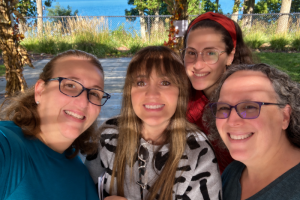 Smiling-Lakeside-Selfie-with-Friends